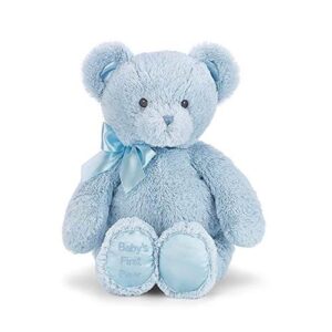 A blue teddy bear with a bow on its neck.