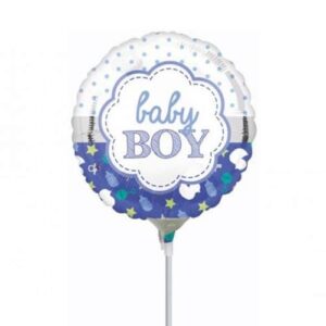 A baby boy balloon is shown on a stick.