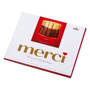 A box of merci chocolates is shown.
