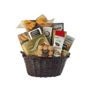 A basket of food with nuts and chocolates.