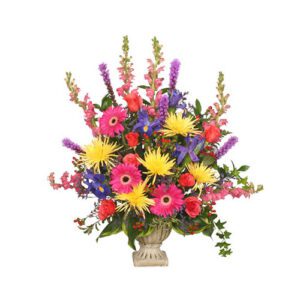 A bouquet of flowers in a vase on top of a table.