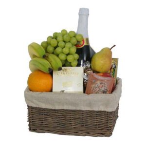 A basket of fruit and wine is shown.