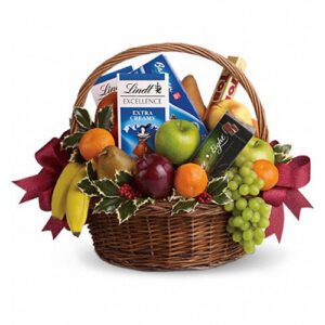 A basket of fruit and chocolates is shown.