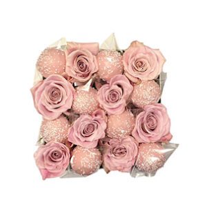 A box of pink roses with white background