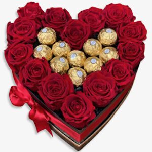A heart shaped box of chocolates and roses.