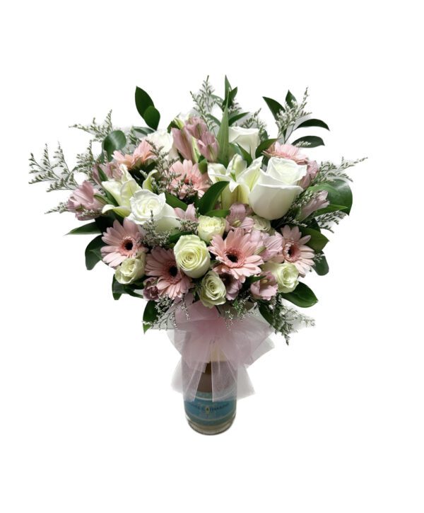 A bouquet of flowers in a vase with a bow.