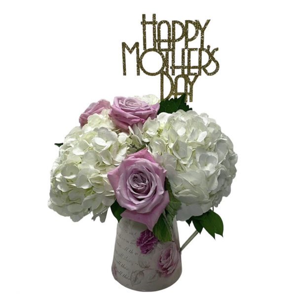 A vase filled with flowers and a happy mother 's day sign.