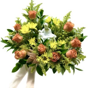 A wreath of flowers with roses and greenery.