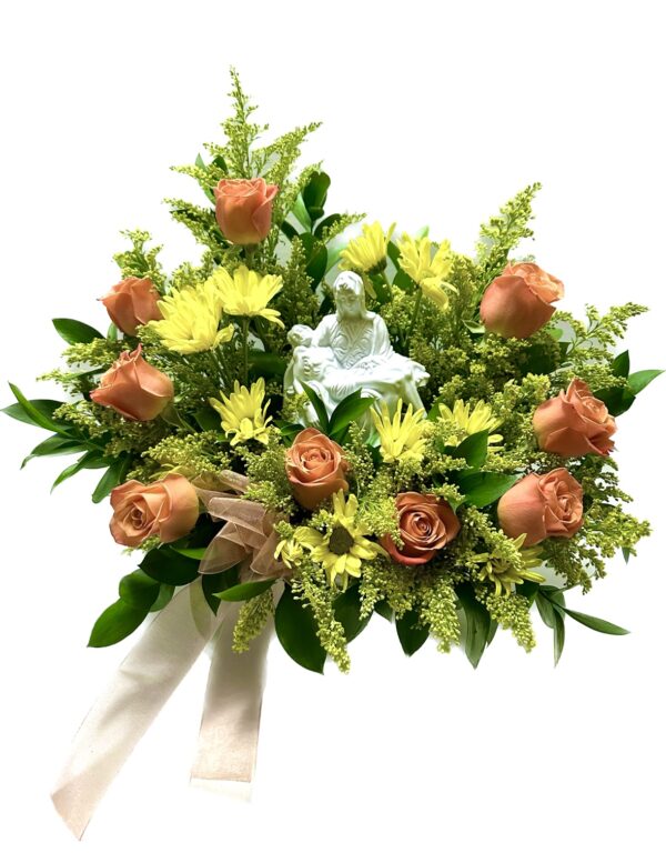 A wreath of flowers with roses and greenery.