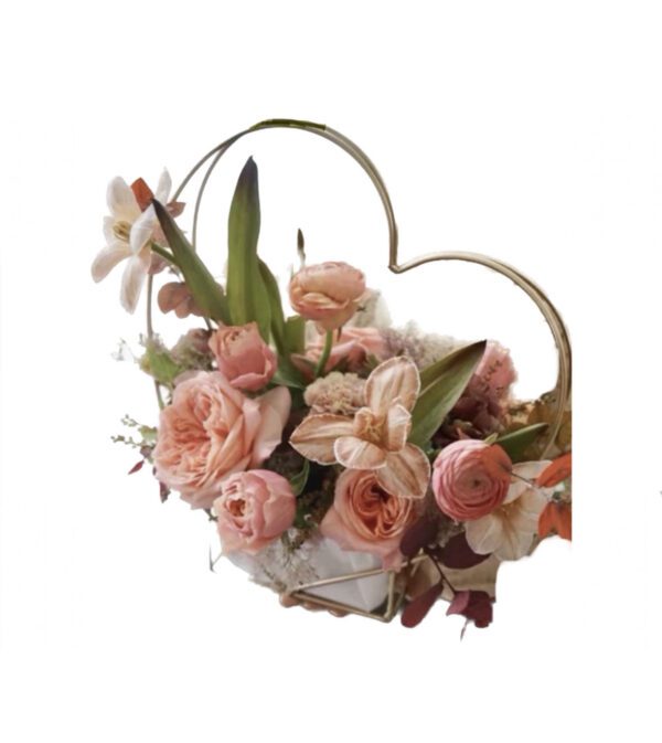 A heart shaped basket filled with flowers.