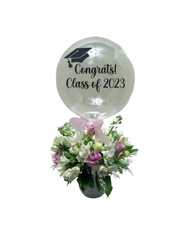 A balloon with flowers in it that says " congrats class of 2 0 2 3 ".