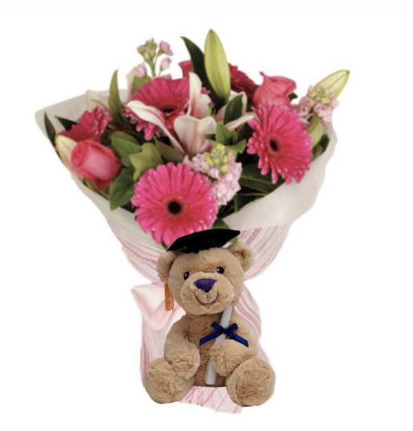 A teddy bear with flowers in it