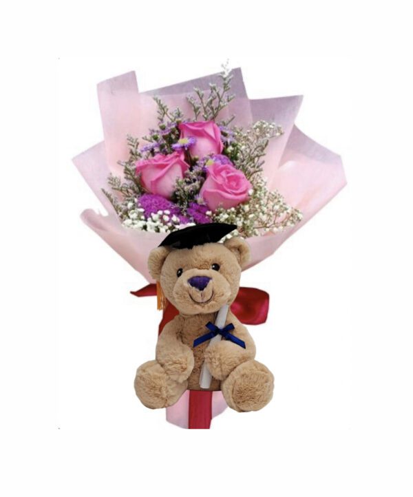 A teddy bear with roses in it